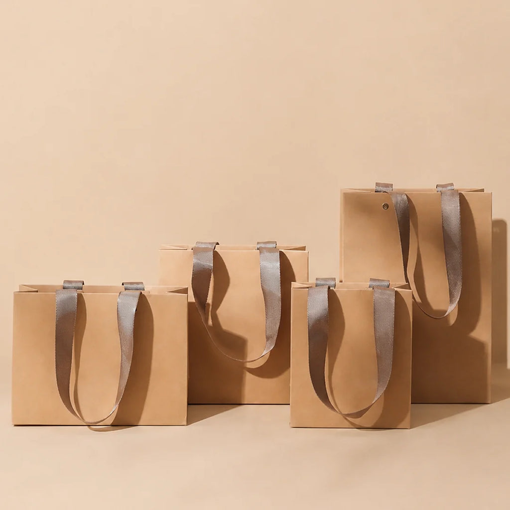 Kraft Shopping Bag with Riveted Handle for retail shopping - custom with logo