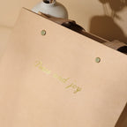 Kraft Shopping Bag with Riveted Handle for retail shopping - custom with logo