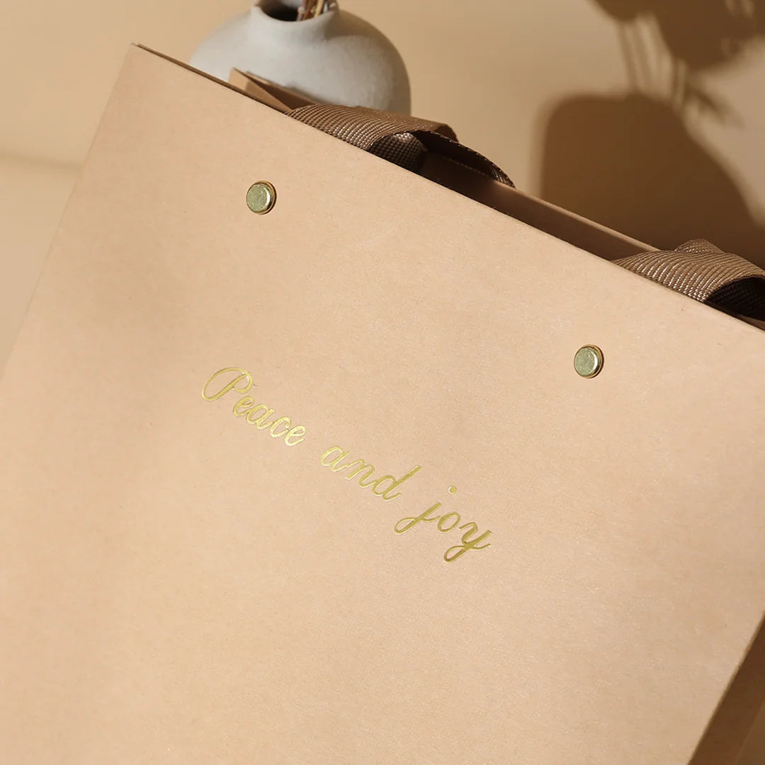 Kraft Shopping Bag with Riveted Handle for retail shopping - custom with logo