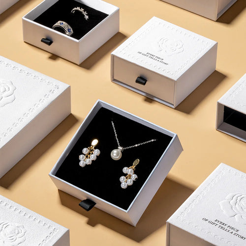white luxury jewelry packaging with embossing rose