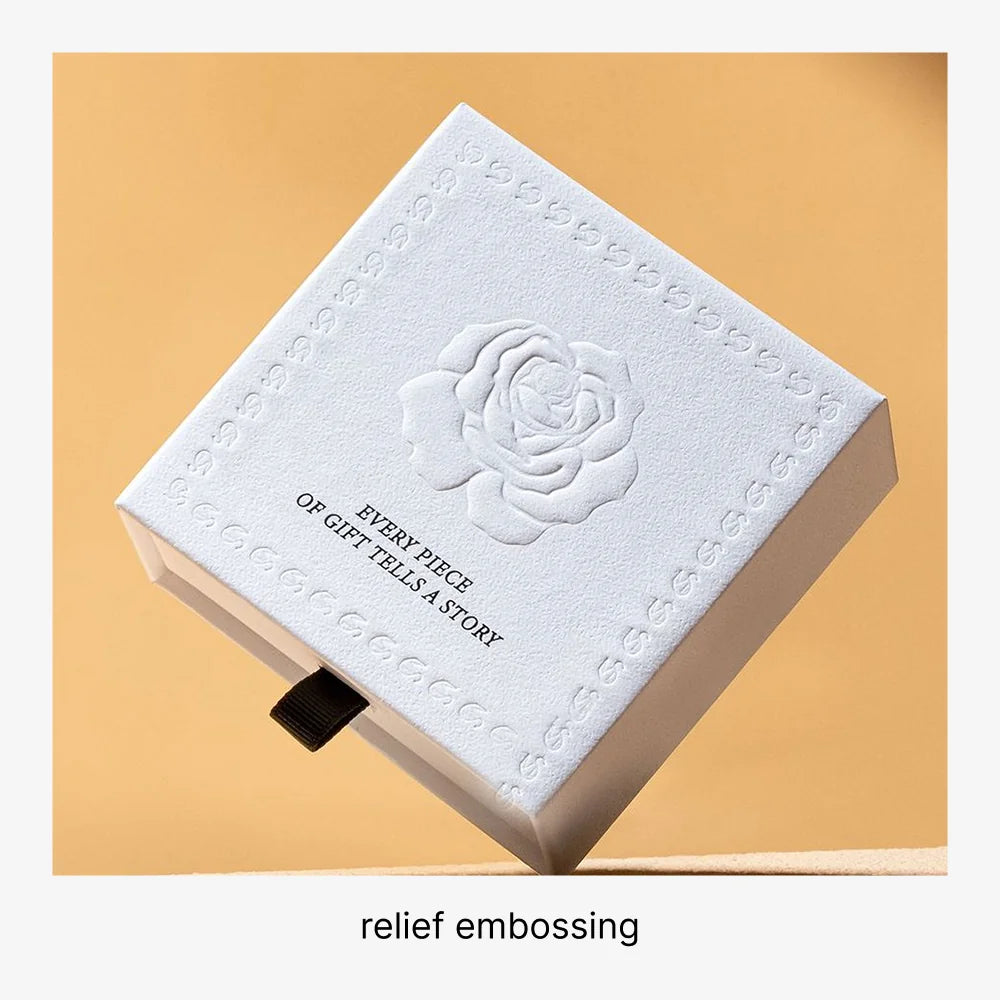 white luxury jewelry packaging with embossing rose
