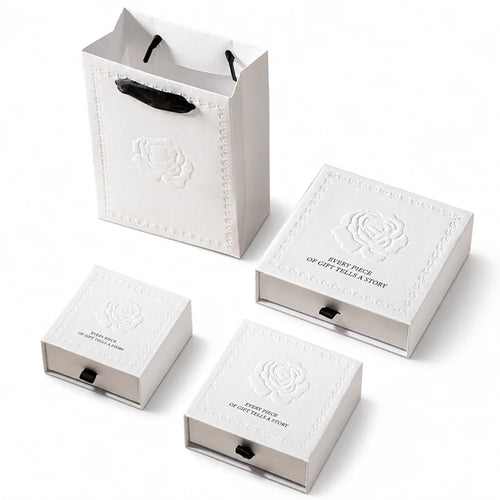 white luxury jewelry packaging with embossing rose